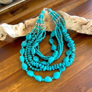 Faux turquoise bib necklace.